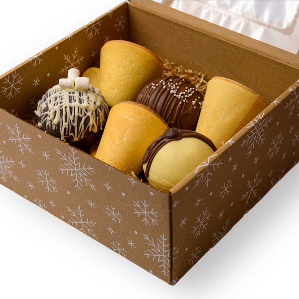 Zestaw bombeczki czekoladowe i jadalne filiżanki